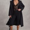 Plunge-Neck Lace Bodysuit in Black